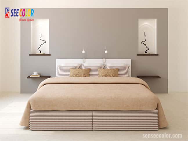 Bức tường phía sau giường ngủ được sơn màu điểm nhấn